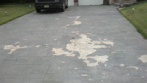 how to fix stamped concrete cracks